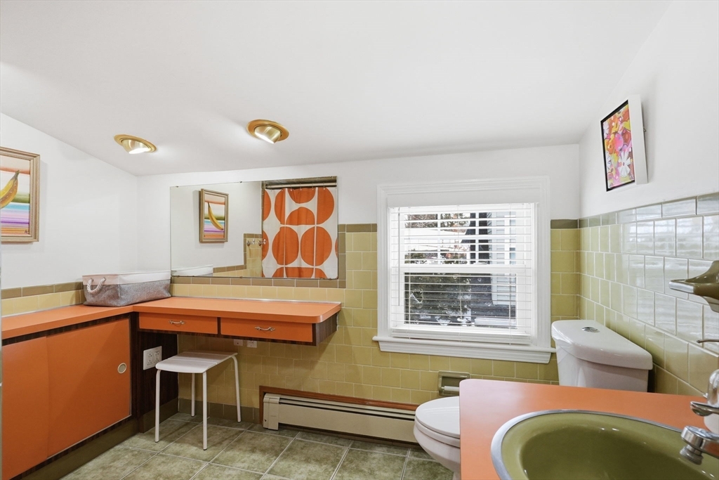 17 Vogel Street Boston, MA 02132 - Photo 33 of 43 a bedroom with a bed and a window