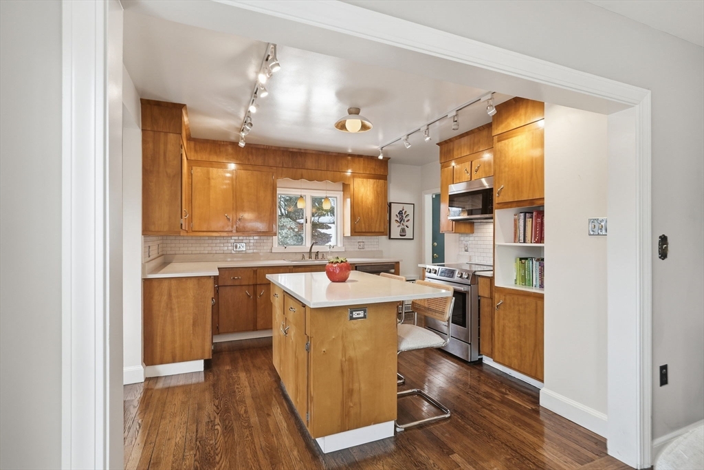 17 Vogel Street Boston, MA 02132 - Photo 8 of 43 a view of a kitchen and dining room
