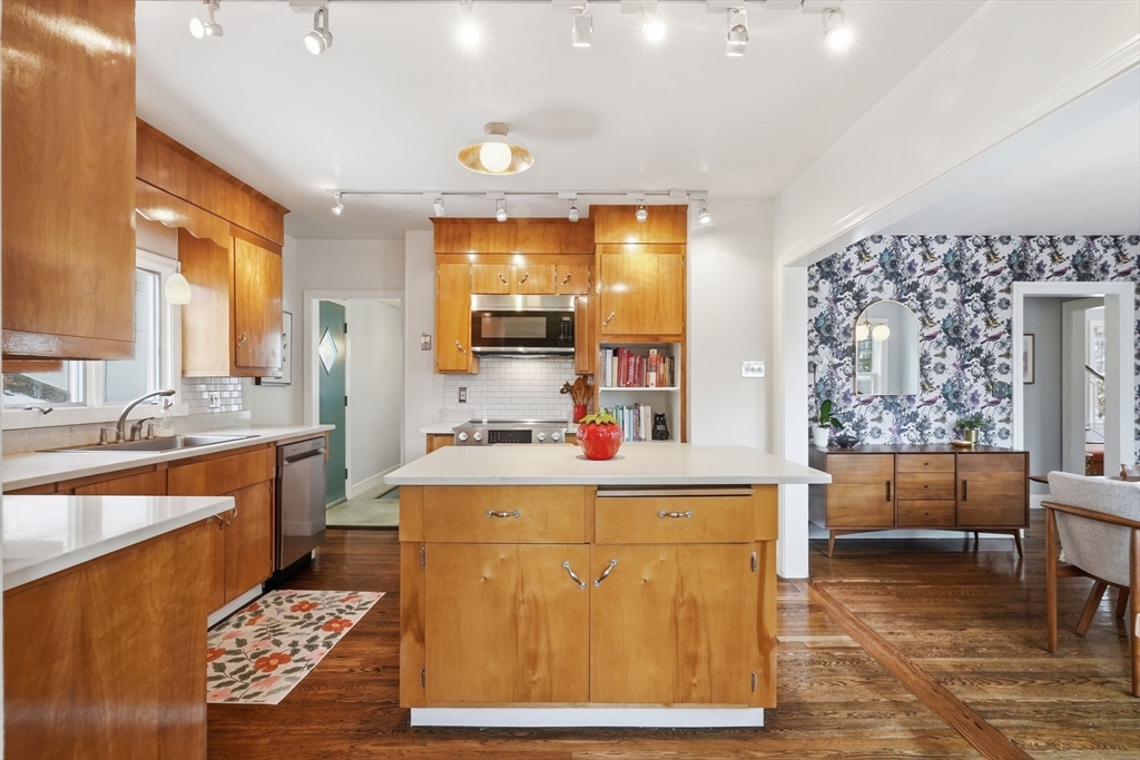 17 Vogel Street Boston, MA 02132 - Photo 9 of 43 a living room with a couch and a table