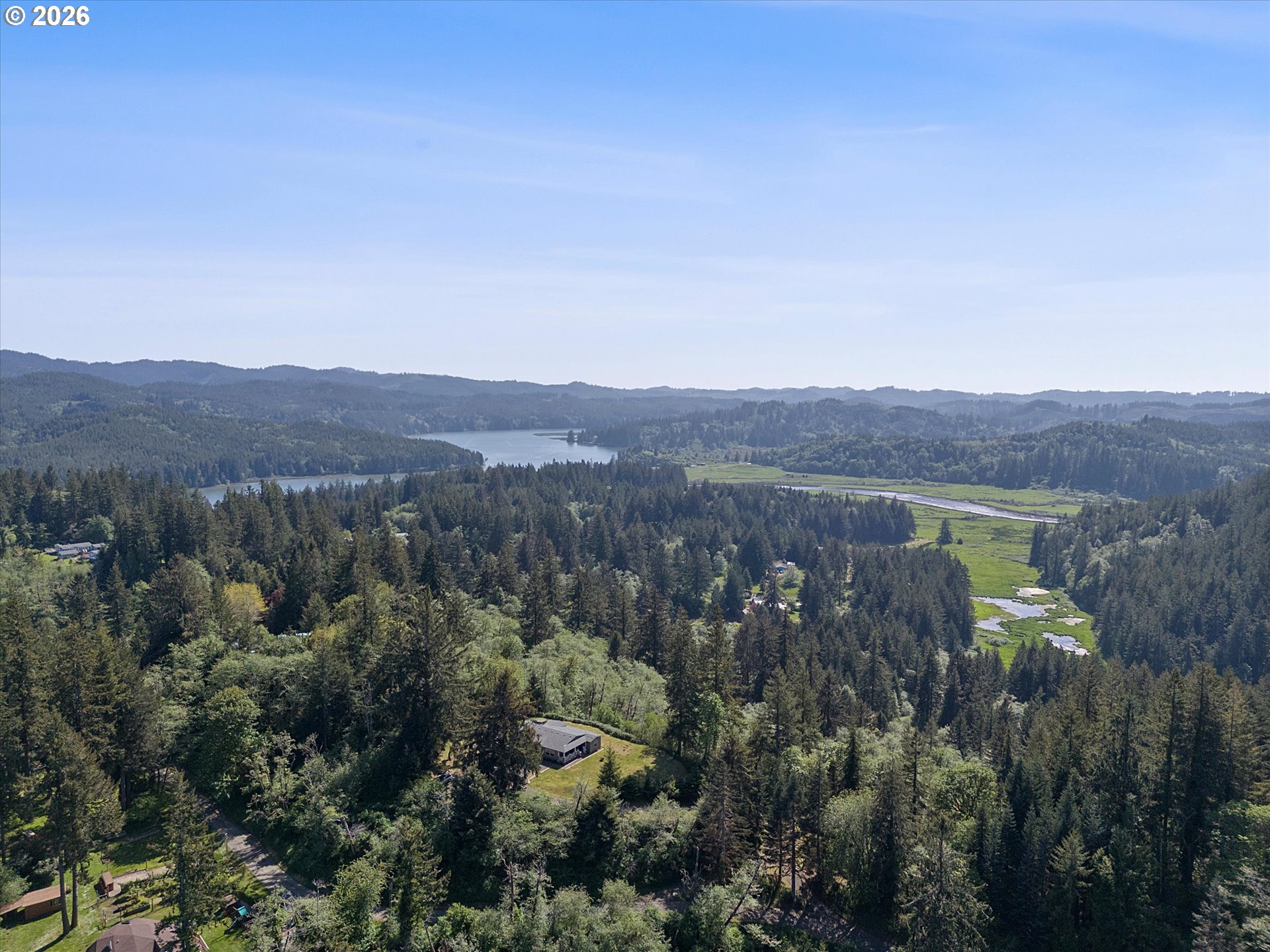 1206 Criteser Loop Toledo, OR 97391 - Photo 43 of 46 an aerial view of residential house and green space