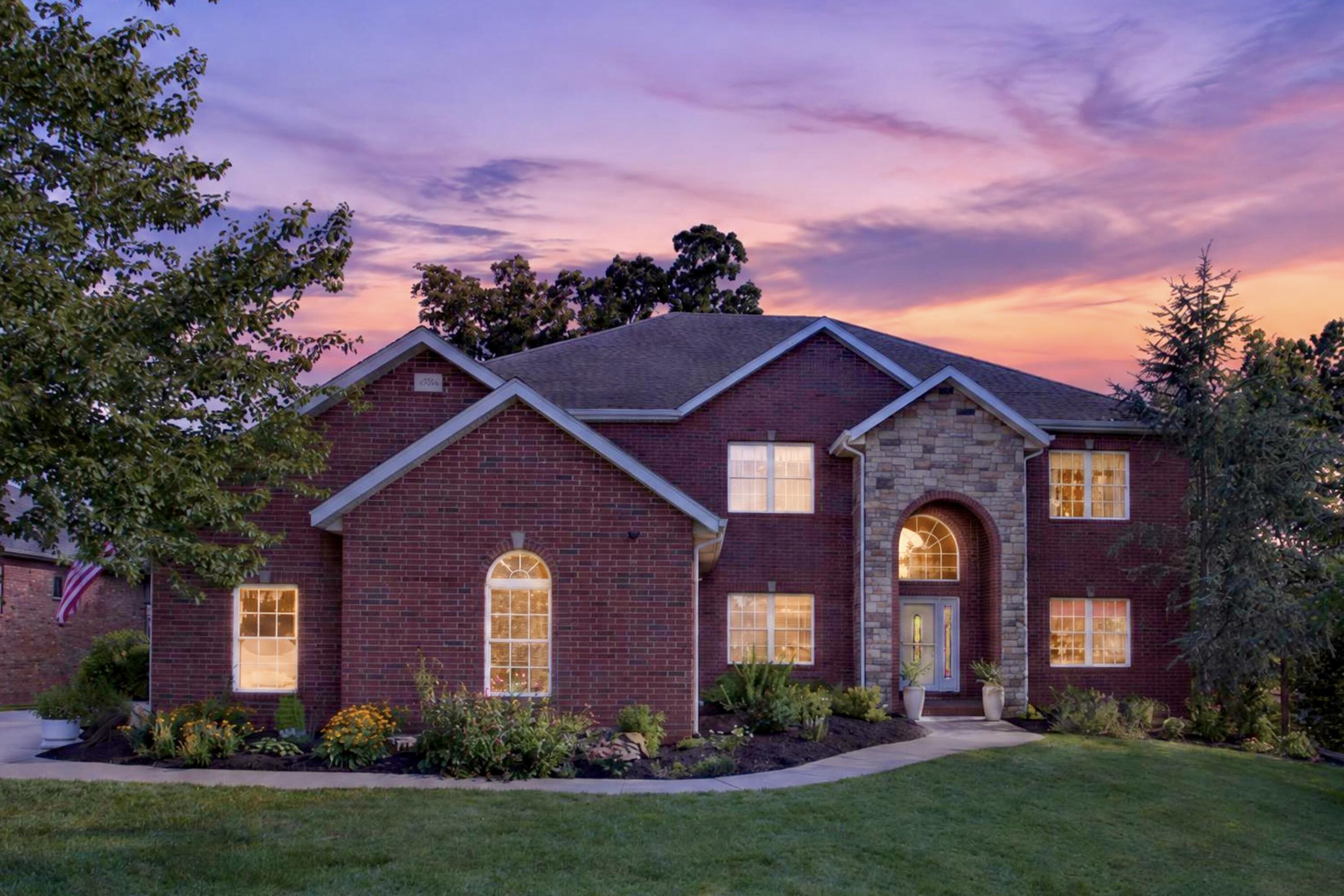6006 Copper Ridge Street Nixa, MO 65714 - Photo 1 of 71 074_4H7A7491_twilight-2