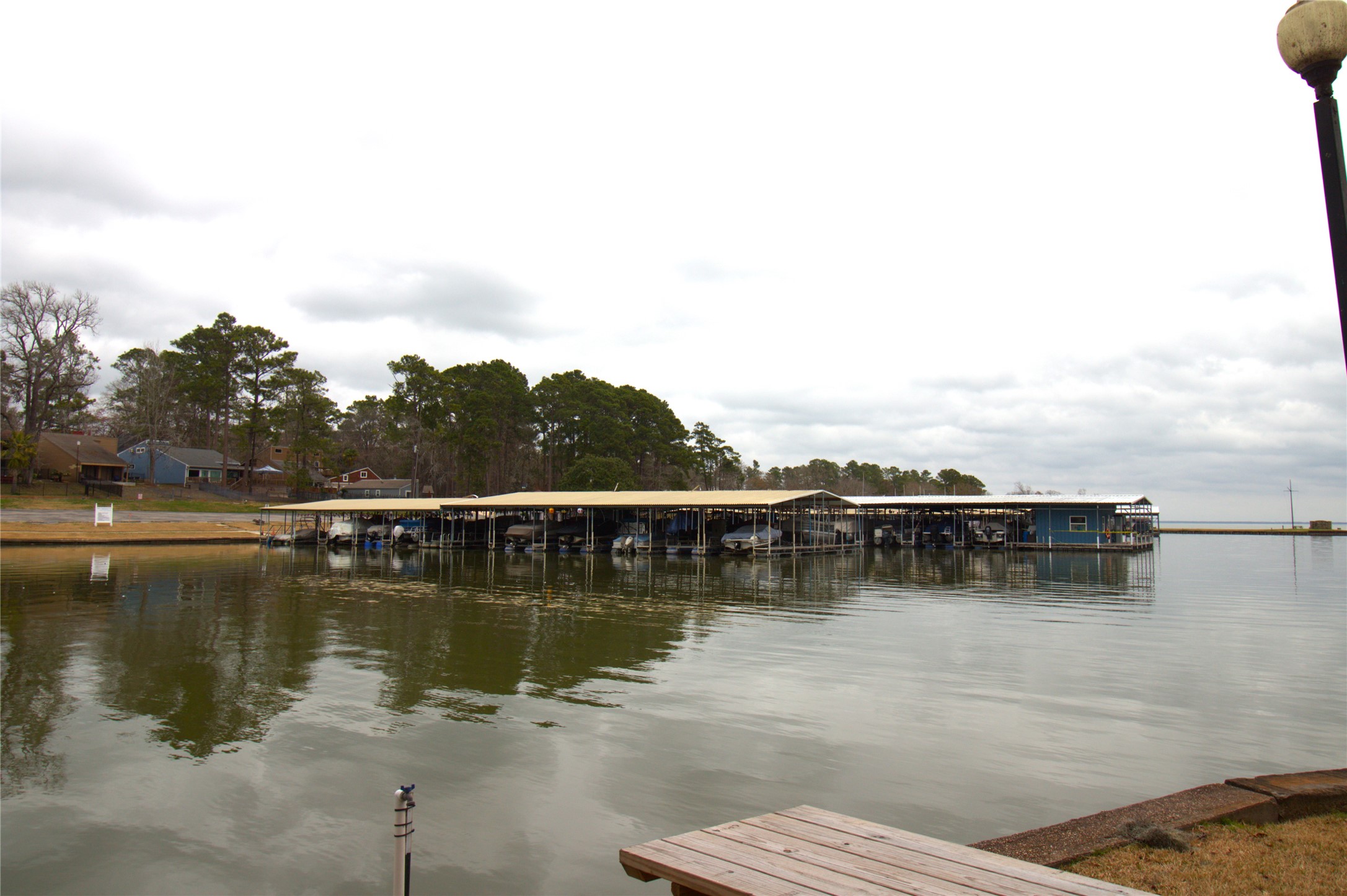 122 Kings Way Coldspring, TX 77331 - Photo 18 of 19 a view of a lake with houses