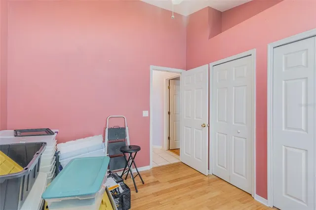 a room that has a bed and a chair in it