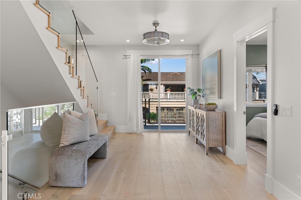 16760 A Bayview Drive Sunset Beach, CA 90742 - Photo 20 of 53 a living room with furniture and a table