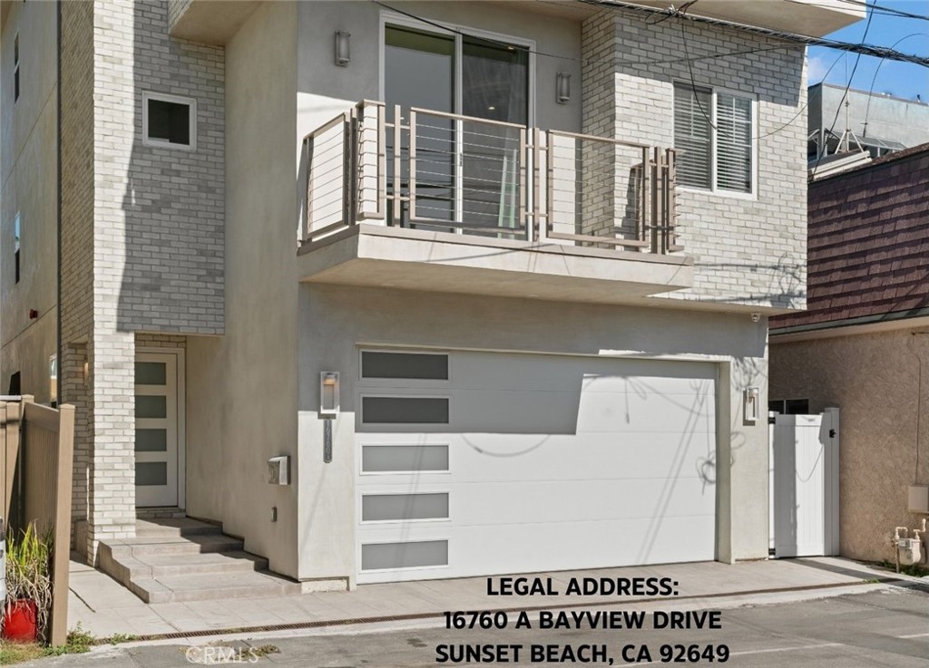 16760 A Bayview Drive Sunset Beach, CA 90742 - Photo 2 of 53 a view of a building with a window
