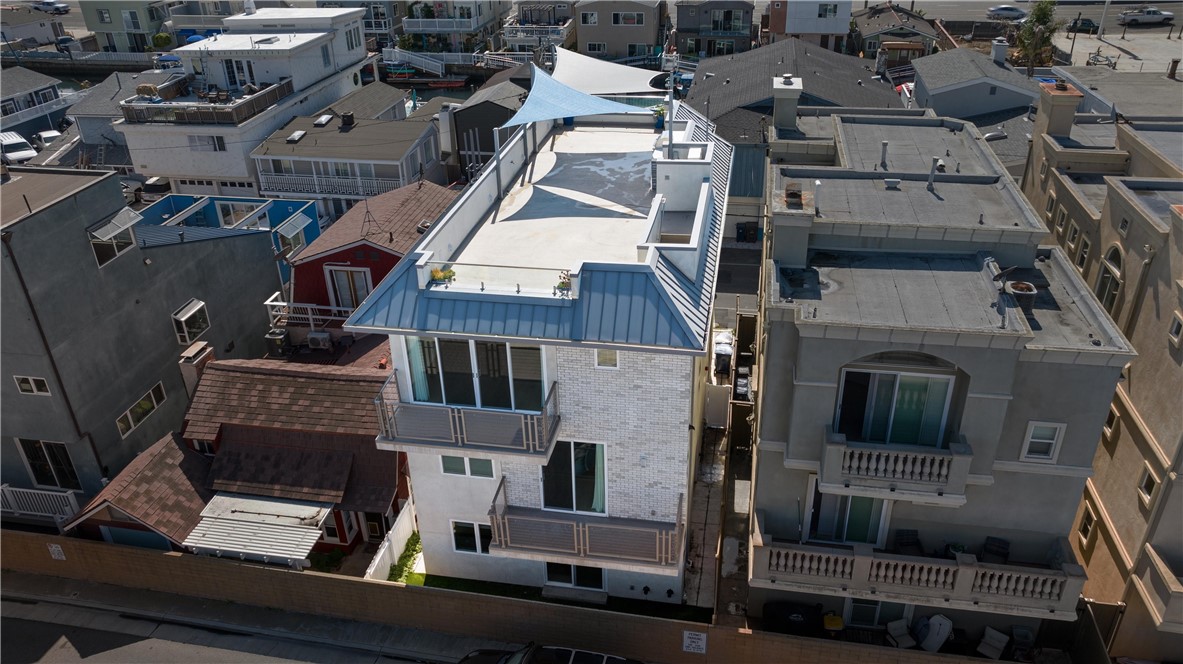 16760 A Bayview Drive Sunset Beach, CA 90742 - Photo 48 of 53 an aerial view of a house with a yard