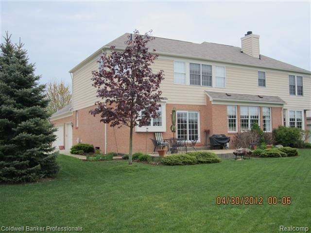 17185 Orchard Ridge Road Northville, MI 48168 - Photo 3 of 25 Back of home