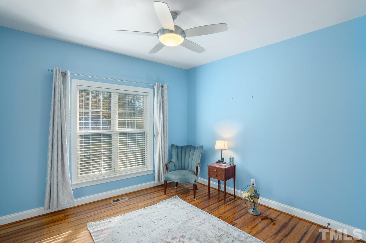 6800 Cool Pond Road Raleigh, NC 27613 - Photo 14 of 26 a living room with furniture and a window