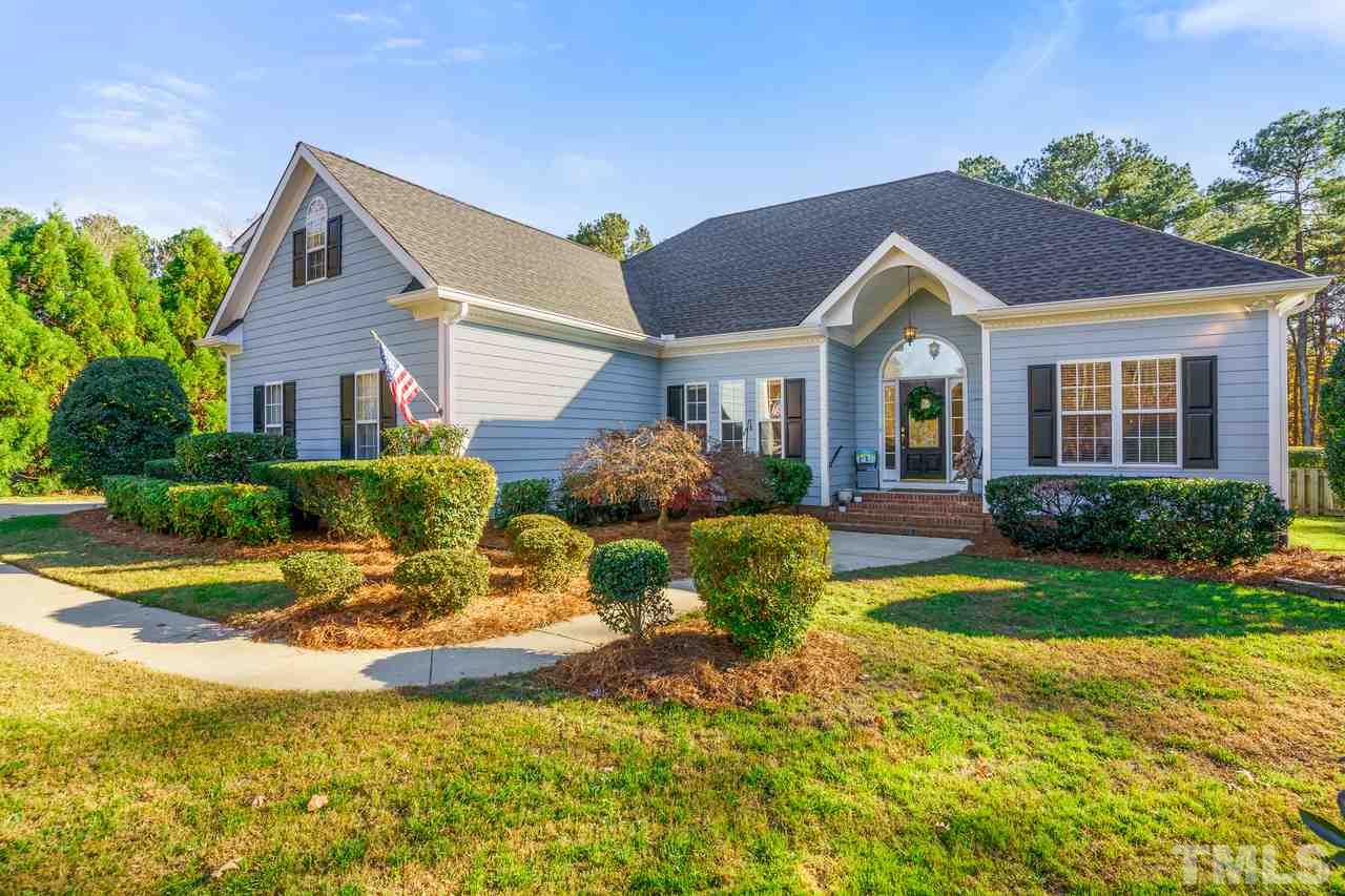 6800 Cool Pond Road Raleigh, NC 27613 - Photo 3 of 26 a front view of house with yard and green space