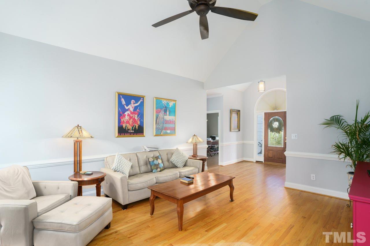 6800 Cool Pond Road Raleigh, NC 27613 - Photo 8 of 26 a living room with furniture and a potted plant