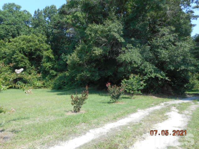 10401 Ten-Ten Road Raleigh, NC 27603 - Photo 4 of 18 a view of a tree in a yard
