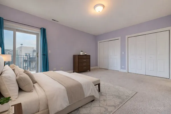 a view of an empty room and closet area