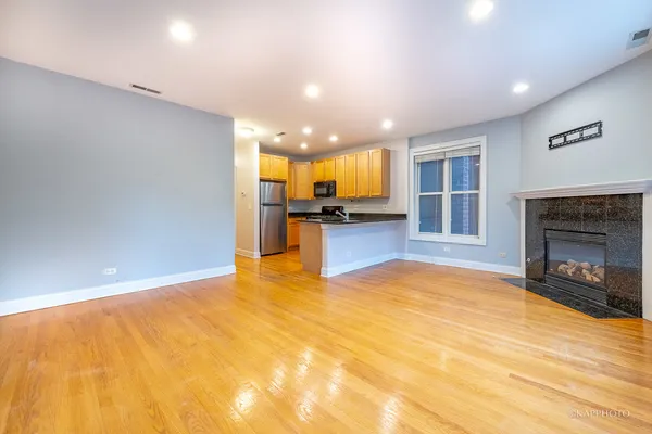 a view of a livingroom with a fireplace