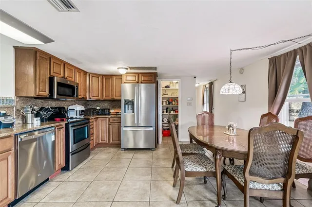 a bed room with a bed and furniture