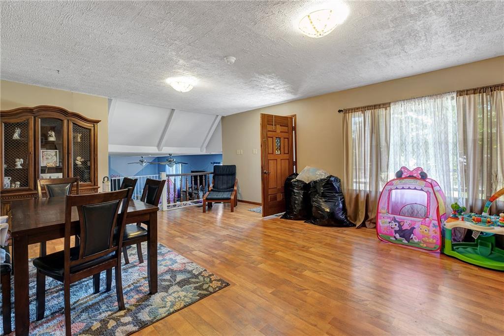 Another view of the space showing the sunken living room and all the space that this unit offers.