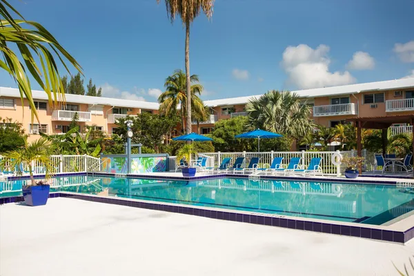 a view of a swimming pool with a patio
