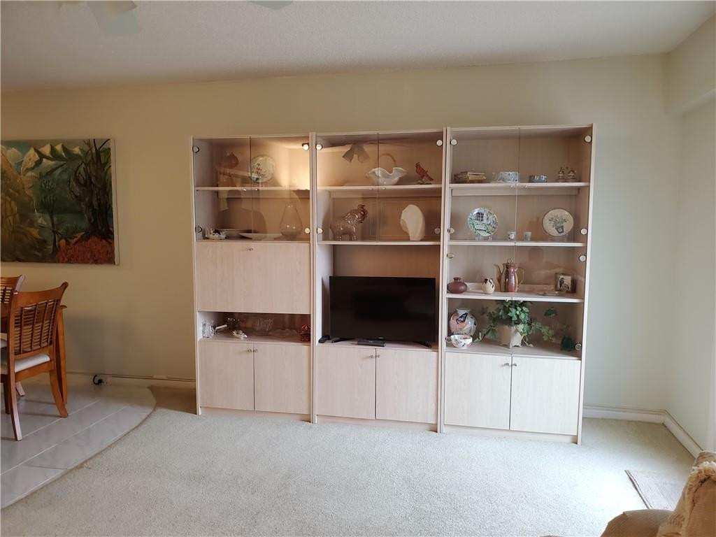 41 Suffolk A, Unit 41 Boca Raton, FL 33434 - Photo 1 of 12 a room with storage and utility
