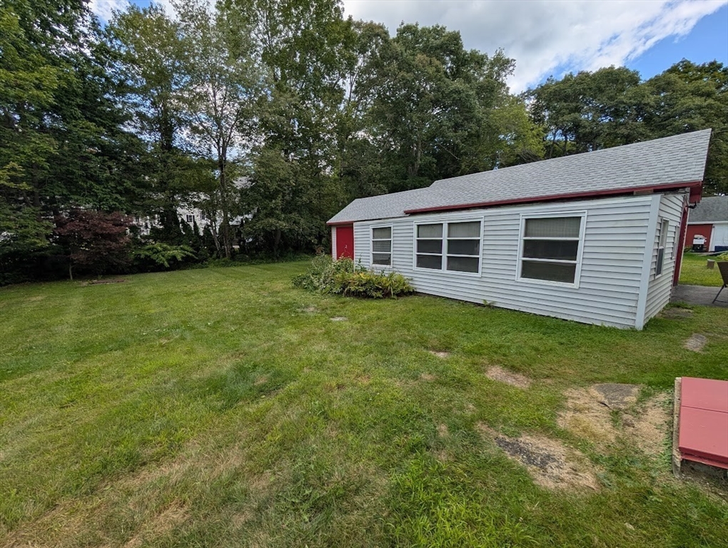 66 Brookfield Road Charlton, MA 01507 - Photo 11 of 35 a view of a house with a backyard