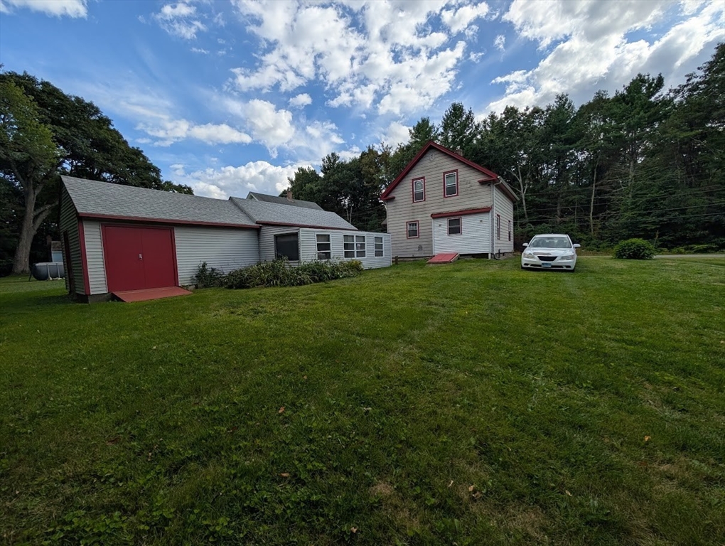 66 Brookfield Road Charlton, MA 01507 - Photo 2 of 35 a house view with a garden space