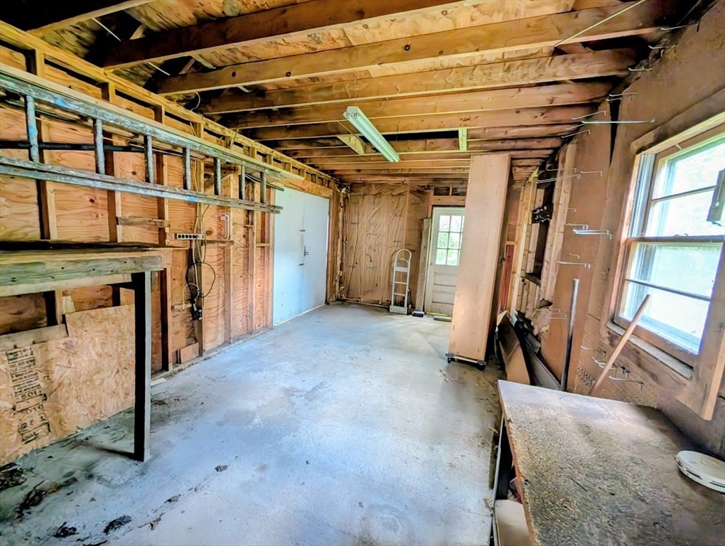 66 Brookfield Road Charlton, MA 01507 - Photo 21 of 35 a view of an empty room with wooden floor