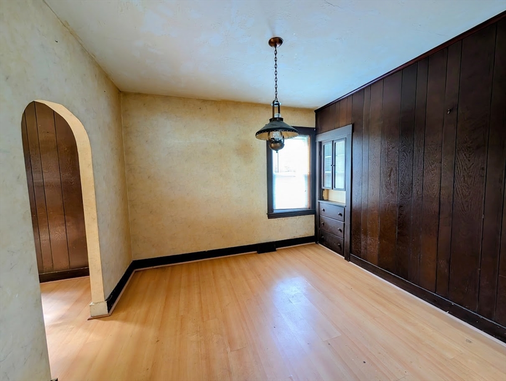66 Brookfield Road Charlton, MA 01507 - Photo 9 of 35 a view of empty room with window and hardwood floor