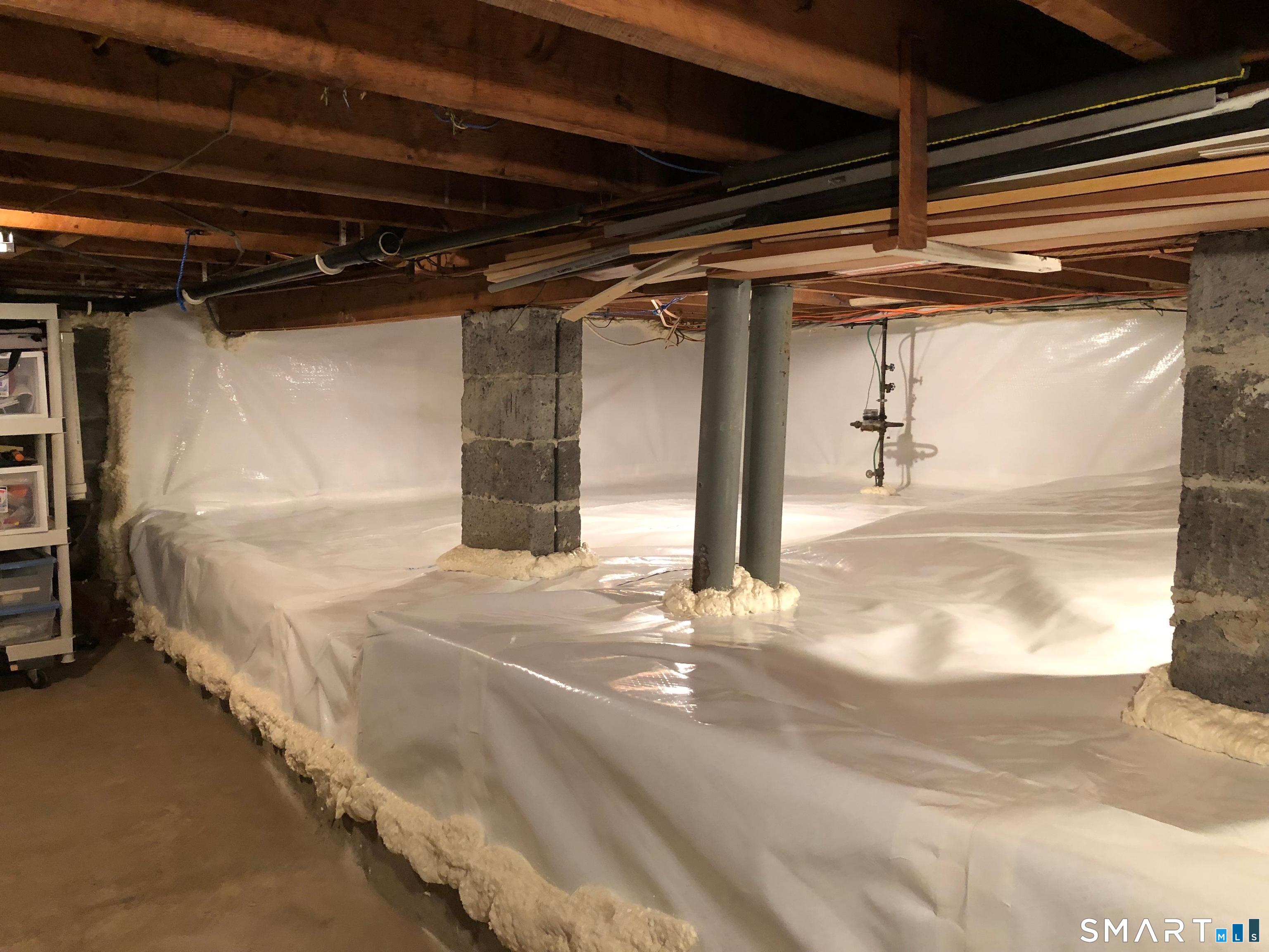 3 Mohican Road West Westbrook, CT 06498 - Photo 37 of 40 The basement has an exterior entry and treated with a moisture barrier.