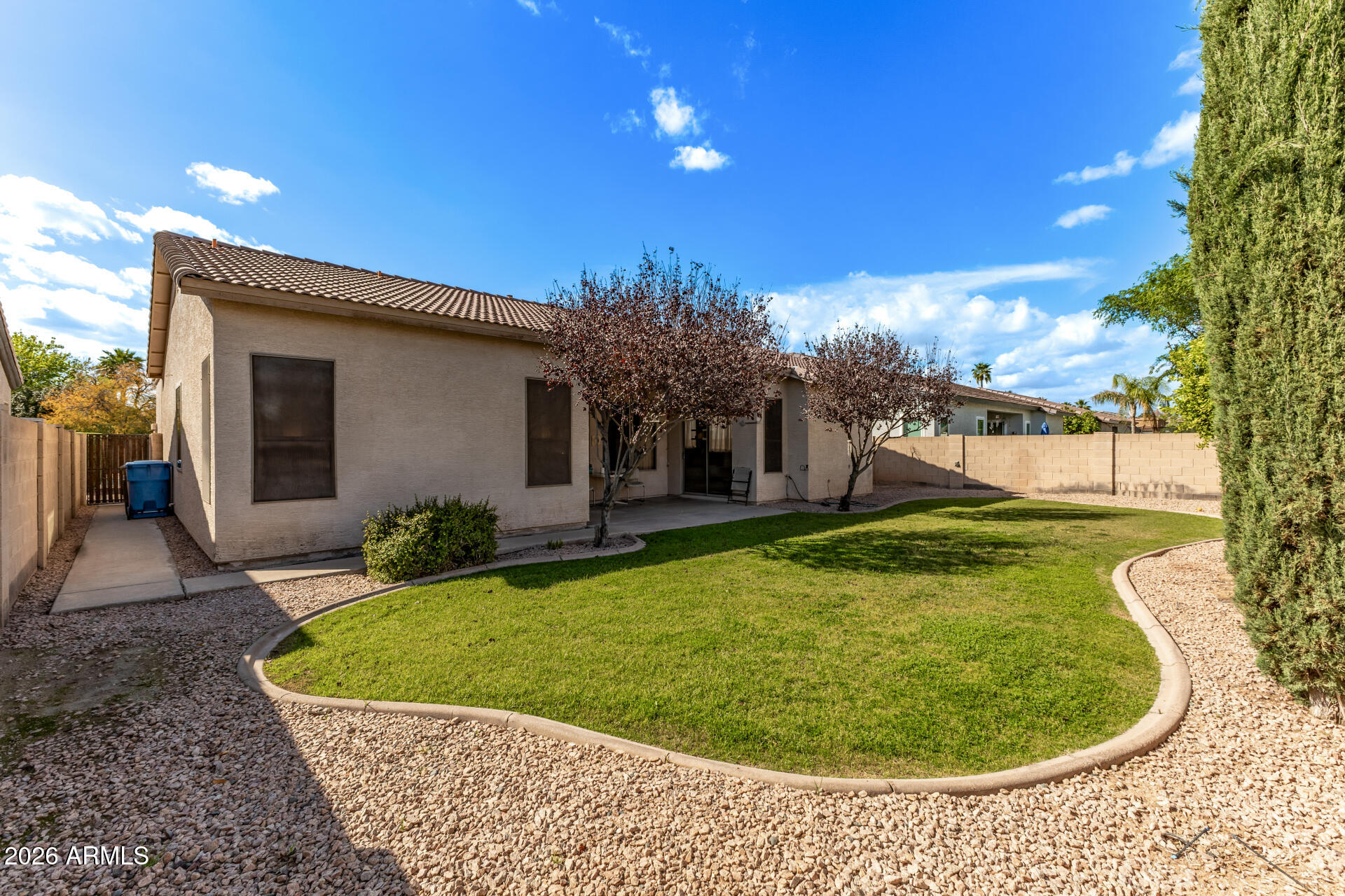 1865 South Morrison Lane Gilbert, AZ 85295 - Photo 28 of 30 a view of a swimming pool with a yard