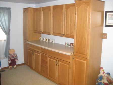5515 Taylor Cemetery Road Franklin, TN 37064 - Photo 14 of 15 Built in cabinetry in the family room is perfect storage for games and books.