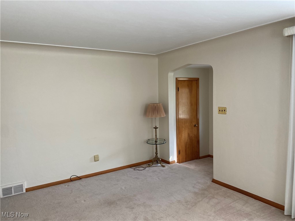 421 Omar Street Struthers, OH 44471 - Photo 4 of 31 View of carpeted empty room
