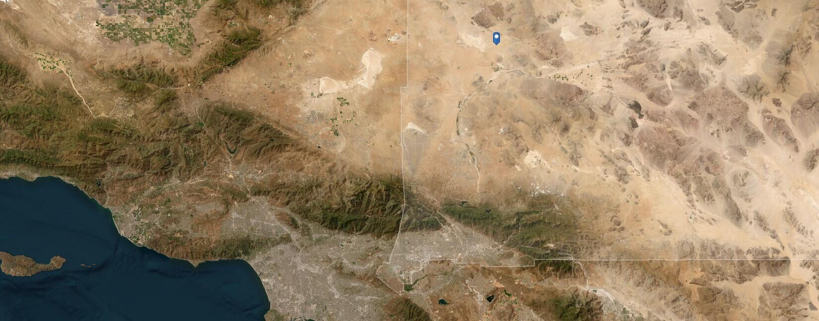 Fossil Bed Road Hinkley, CA 92347 - Photo 14 of 15 a close up of a plant with a shower