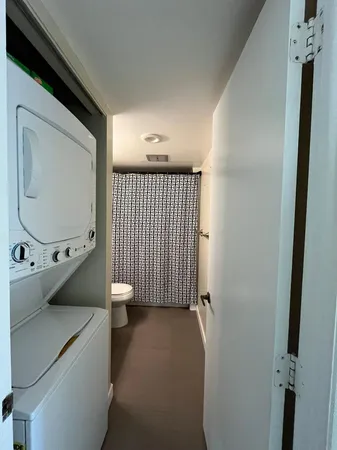 a view of a room that has a washer and dryer