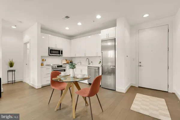 a view of a dining room with furniture