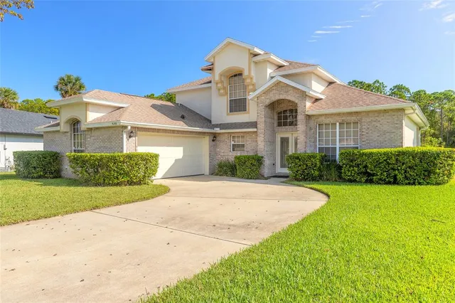 $449,900 | 6180 Knotty Pine Court, Port Orange, FL 32127