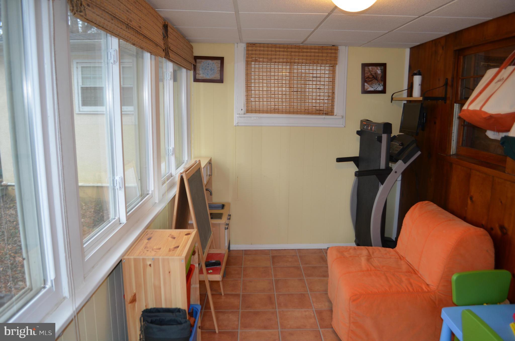 646 Aldershot Road Baltimore, MD 21229 - Photo 14 of 21 a view of a room with gym equipment