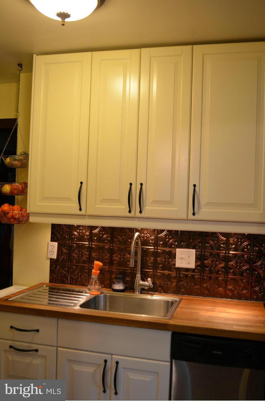 646 Aldershot Road Baltimore, MD 21229 - Photo 8 of 21 a kitchen with a sink and a window