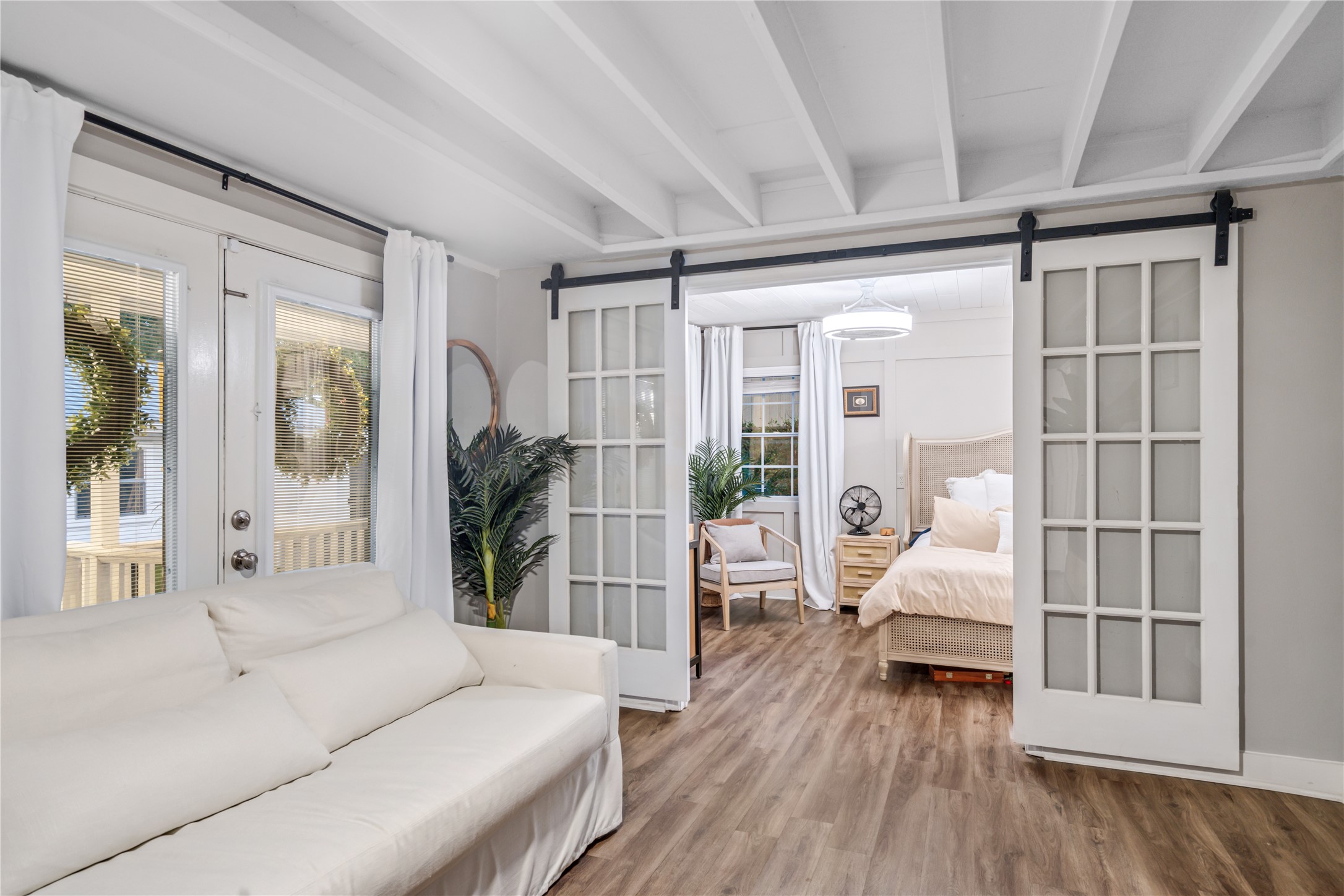 327 Middleton Street Bacliff, TX 77518 - Photo 13 of 23 a living room with furniture and a wooden floor