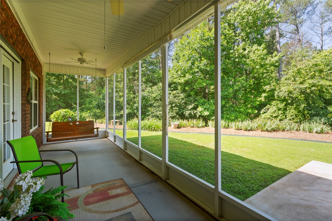 704 Nottingham Court Seneca, SC 29672 - Photo 29 of 48 Screened porch overlooking the private back yard.