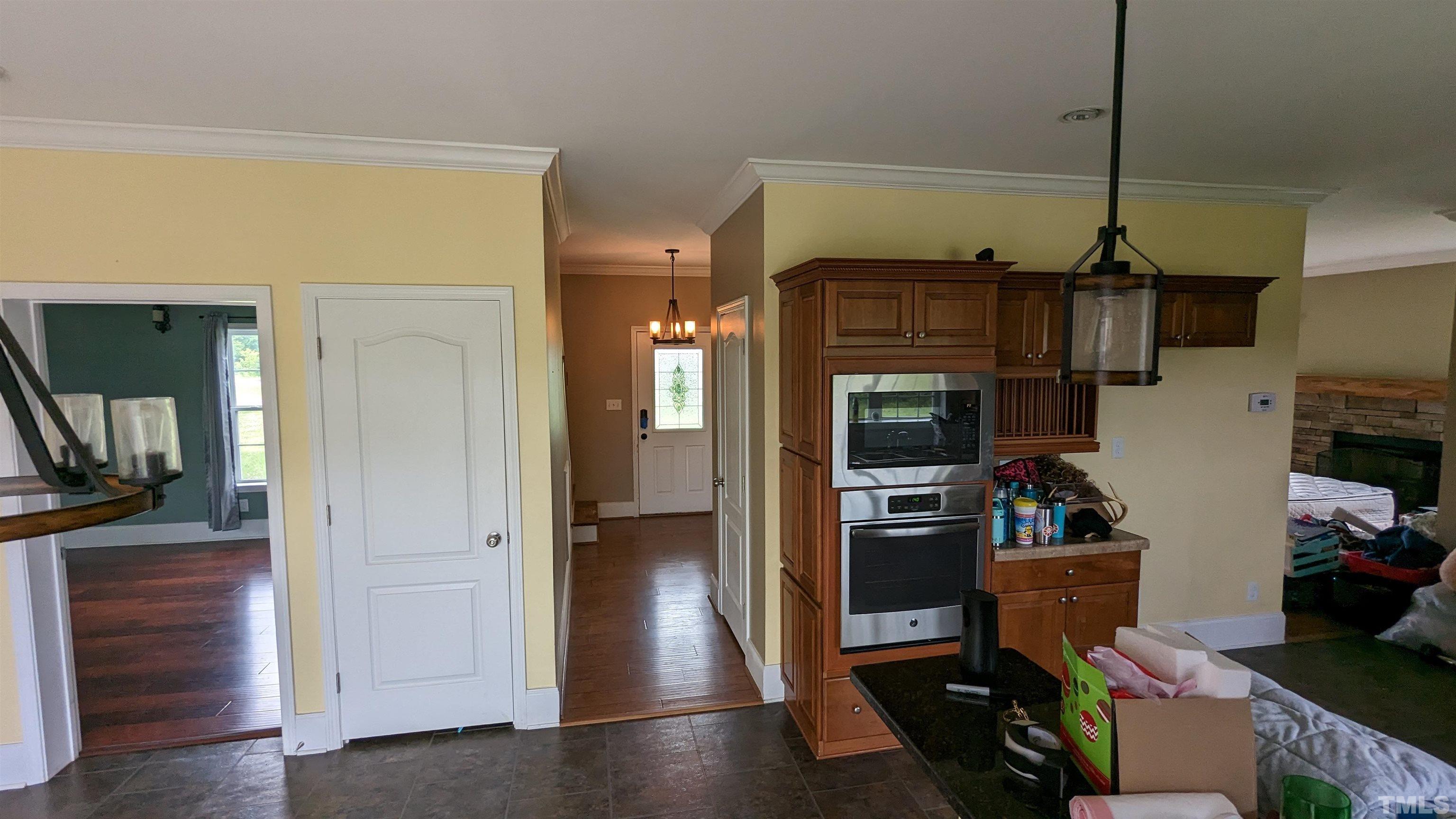304 Bernard Purvis Road Bennett, NC 27208 - Photo 18 of 33 a kitchen with stainless steel appliances granite countertop a refrigerator and a sink