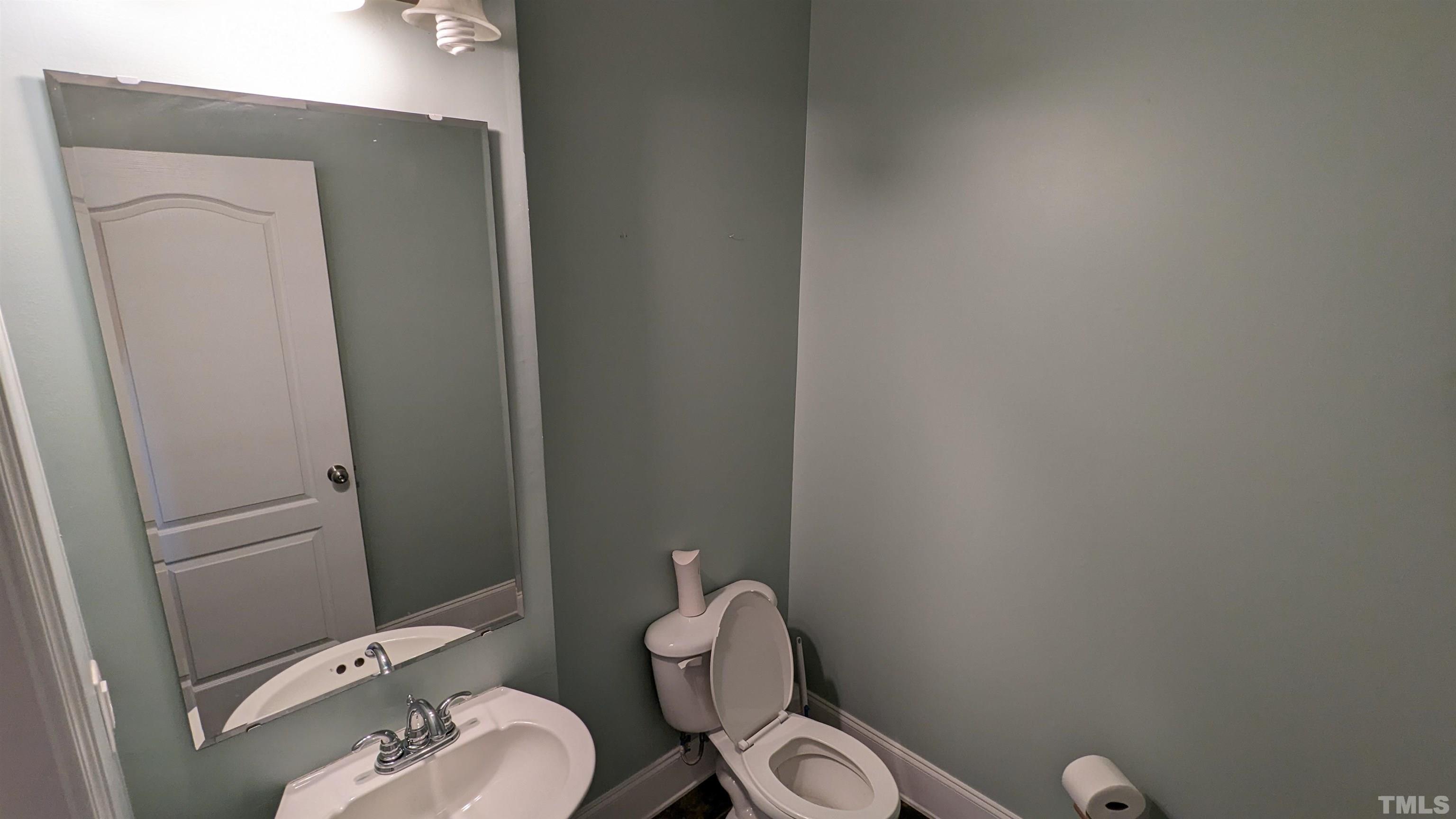 304 Bernard Purvis Road Bennett, NC 27208 - Photo 22 of 33 a bathroom with a toilet