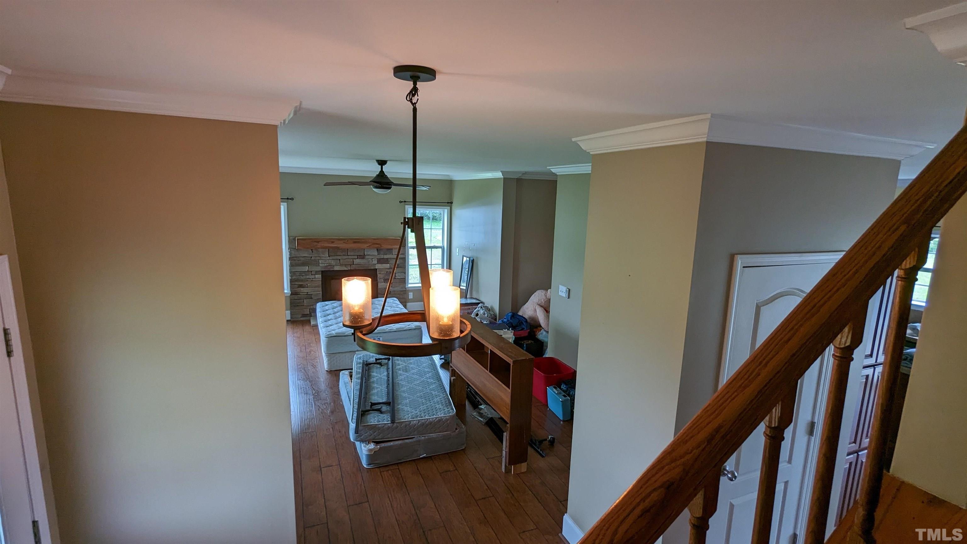 304 Bernard Purvis Road Bennett, NC 27208 - Photo 24 of 33 a view of a livingroom with furniture entryway and wooden floor