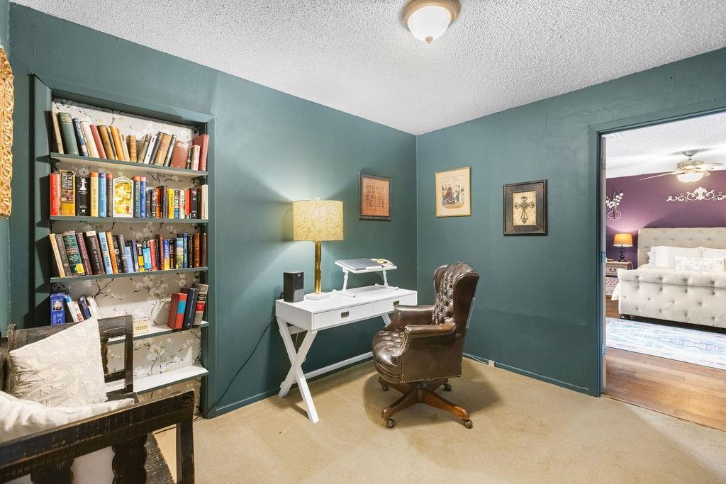 1320 Elm Street Bonham, TX 75418 - Photo 27 of 40 a view of a workspace with furniture