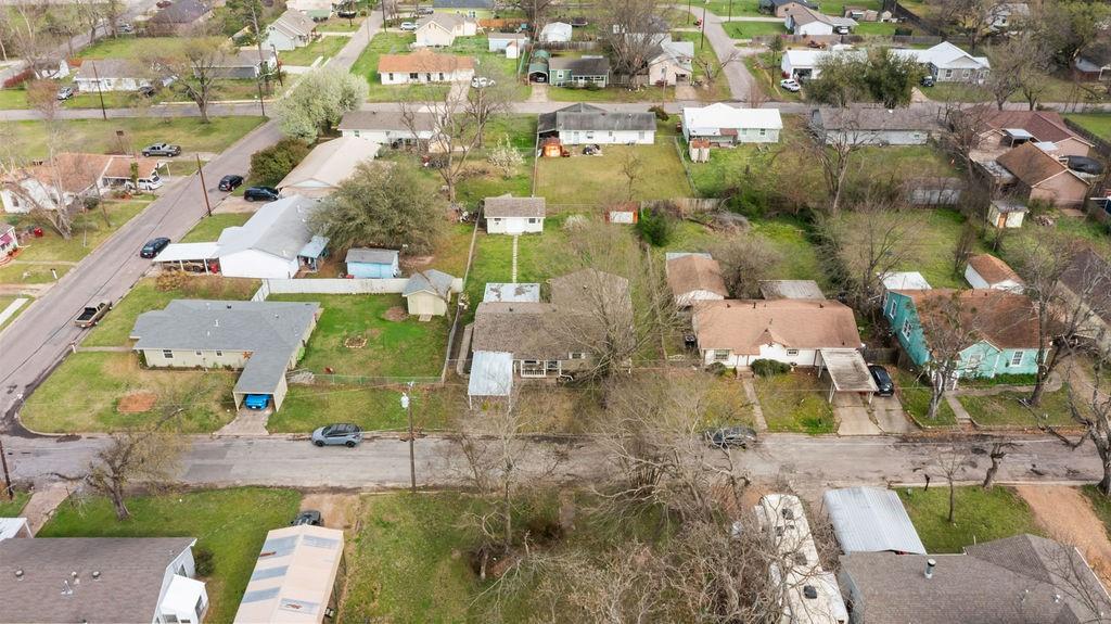 1320 Elm Street Bonham, TX 75418 - Photo 38 of 40 an aerial view of residential houses with outdoor space
