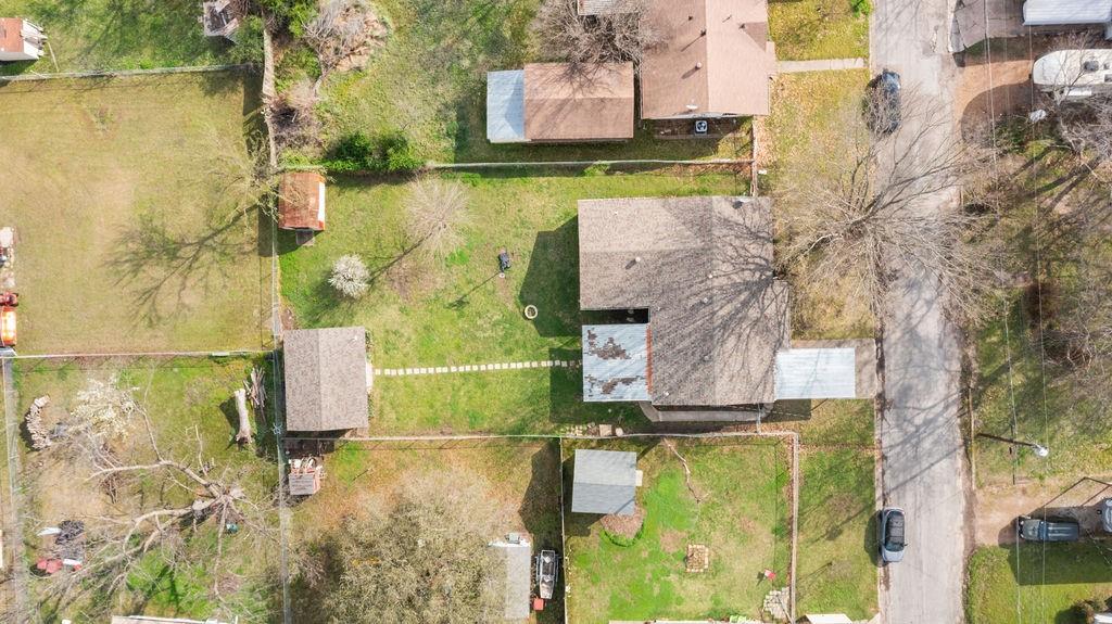 1320 Elm Street Bonham, TX 75418 - Photo 40 of 40 an aerial view of residential houses with outdoor space and swimming pool
