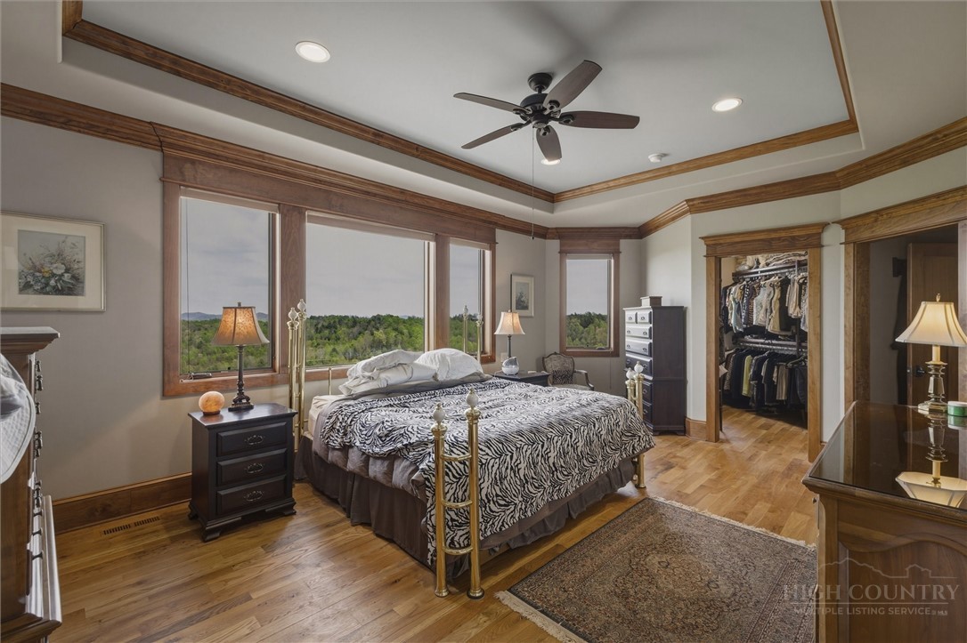 1638 Johns Ridge Parkway Lenoir, NC 28645 - Photo 14 of 50 a bed sitting in a spacious bedroom next to a window