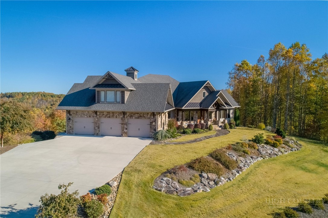1638 Johns Ridge Parkway Lenoir, NC 28645 - Photo 2 of 50 a view of a house with a snow in the background