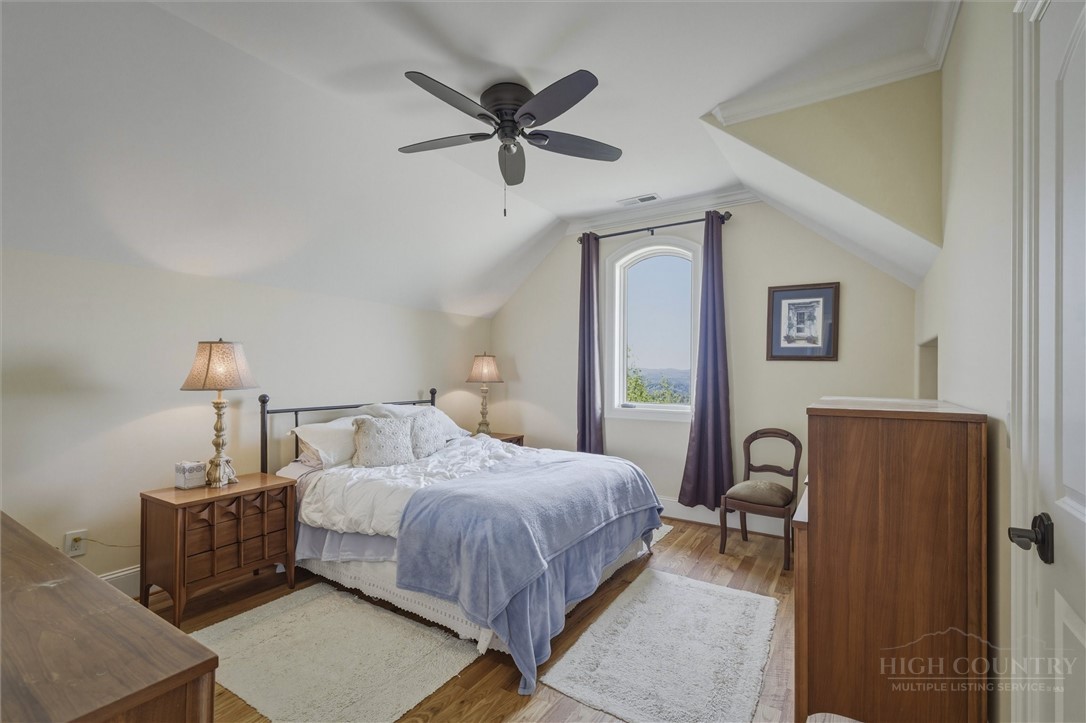 1638 Johns Ridge Parkway Lenoir, NC 28645 - Photo 24 of 50 a bedroom with a bed and a closet