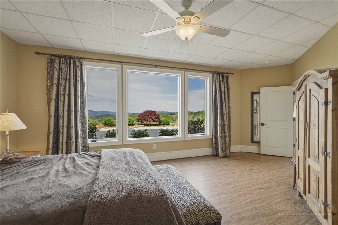 1638 Johns Ridge Parkway Lenoir, NC 28645 - Photo 31 of 50 a bed room with a bed and a large window