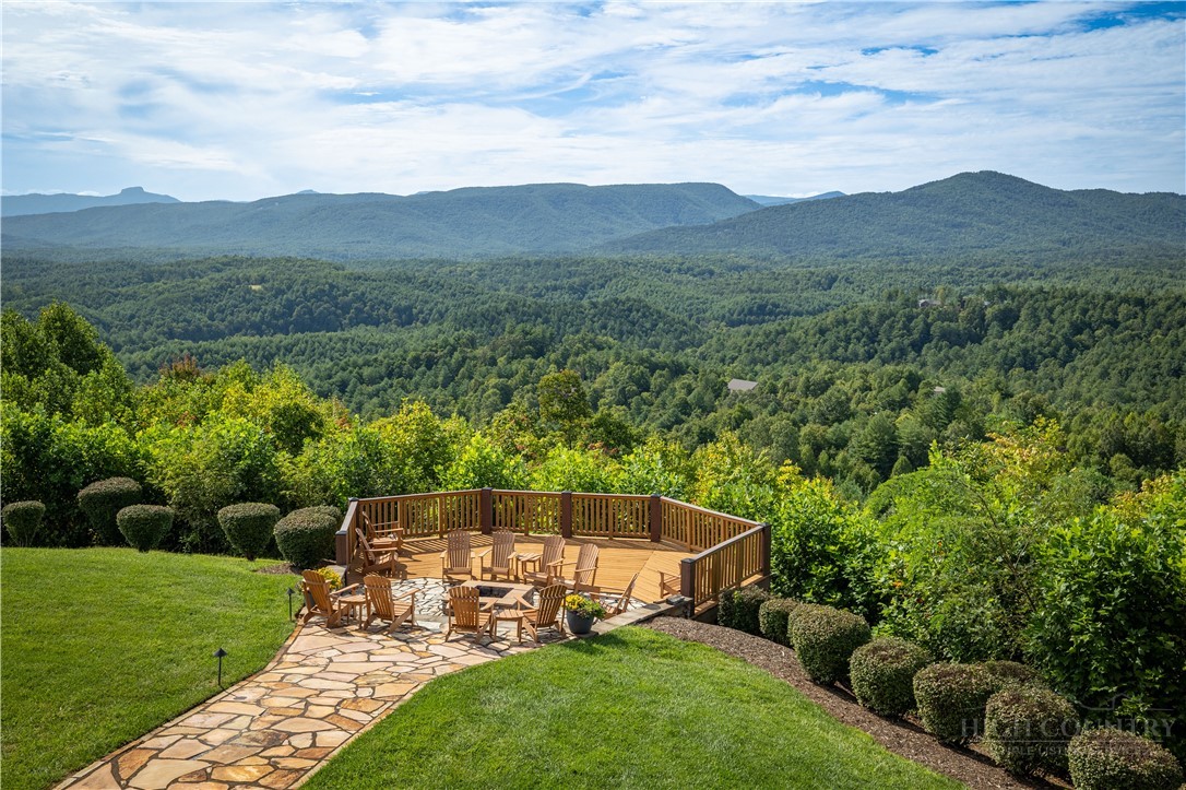 1638 Johns Ridge Parkway Lenoir, NC 28645 - Photo 41 of 50 a view of a backyard with a garden and mountain view