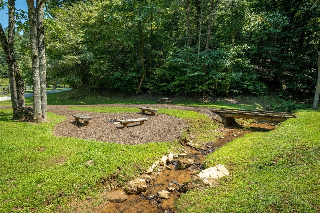 1638 Johns Ridge Parkway Lenoir, NC 28645 - Photo 48 of 50 a view of a swimming pool with a yard