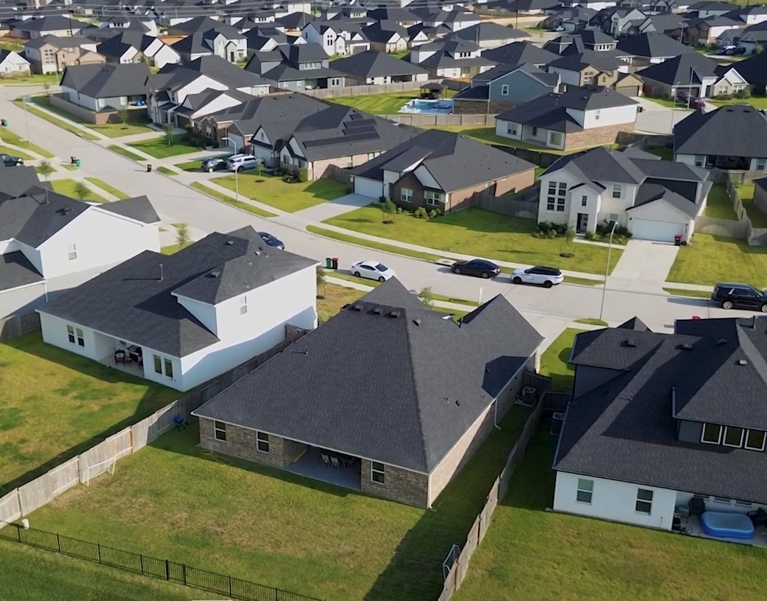 31410 Hexan Heights Lane Fulshear, TX 77441 - Photo 2 of 50 an aerial view of a house with a swimming pool